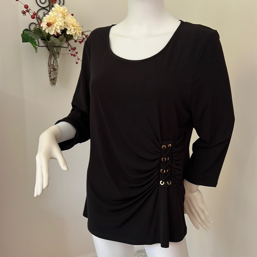 Women’s long sleeve top by Calvin Klein, size large. Black